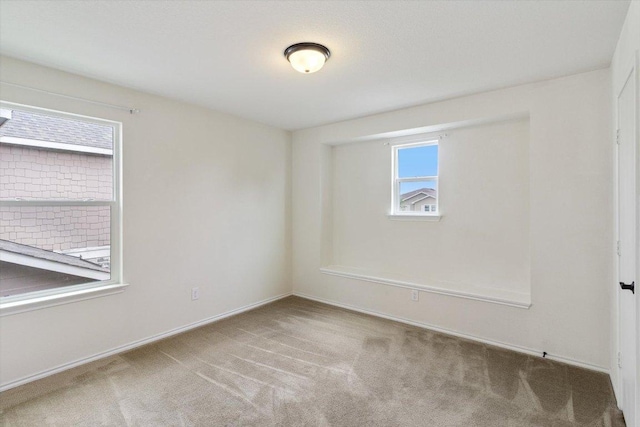 6729 Sunderland Trl, Austin, TX 78747 - carpeted spare room featuring baseboards