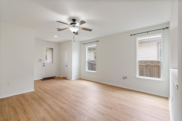 6729 Sunderland Trl, Austin, TX 78747 - spare room featuring light wood finished floors, ceiling fan, baseboards, and recessed lighting