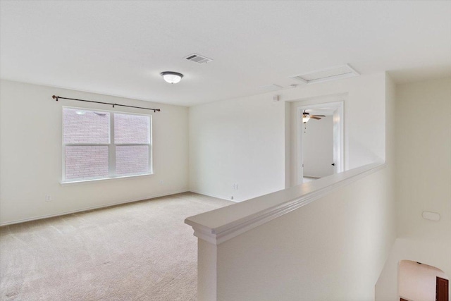 6729 Sunderland Trl, Austin, TX 78747 - spare room with light colored carpet and attic access