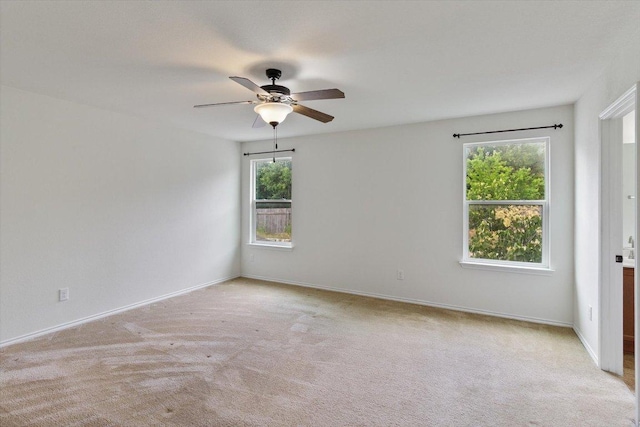 6729 Sunderland Trl, Austin, TX 78747 - carpeted spare room with ceiling fan and baseboards