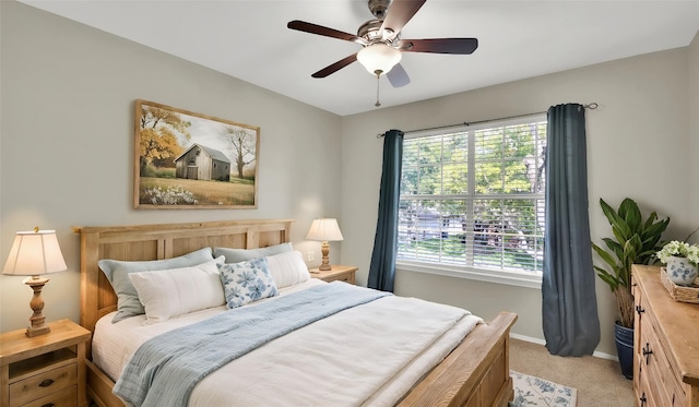 3504 Ashmere Loop SE, Round Rock, TX 78681 - bedroom featuring light colored carpet and ceiling fan