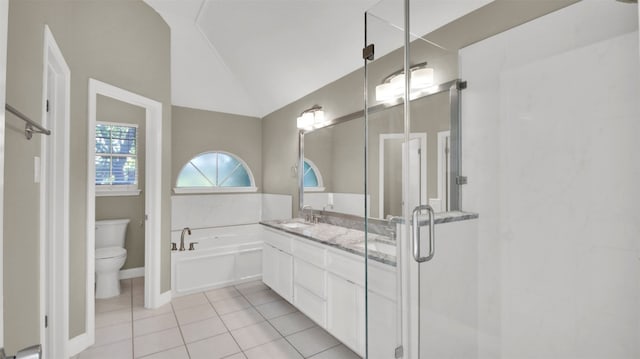 3504 Ashmere Loop SE, Round Rock, TX 78681 - full bath featuring vaulted ceiling, tile patterned flooring, a bath, vanity, and a shower stall