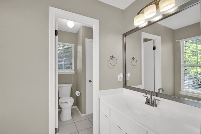3504 Ashmere Loop SE, Round Rock, TX 78681 - bathroom with vanity, tile patterned floors, and healthy amount of natural light