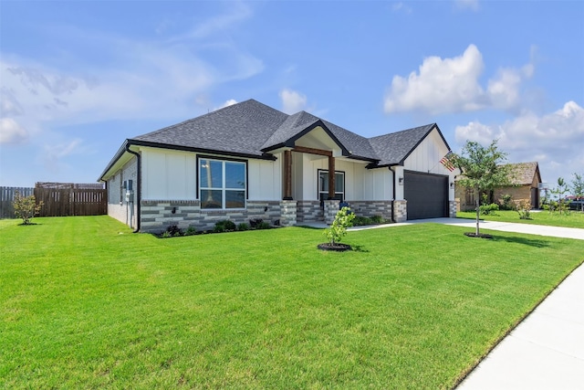 222 Overlook Trl, Copperas Cove, TX 76522 - view of front facade with roof with shingles, concrete driveway, an attached garage, board and batten siding, and stone siding