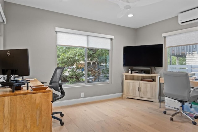 1707 Collier St, Austin, TX 78704 - home office with light wood-style flooring, a wall unit AC, baseboards, recessed lighting, and a ceiling fan