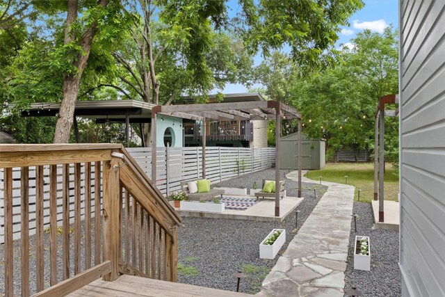 1707 Collier St, Austin, TX 78704 - deck featuring a storage unit, a patio, and a pergola