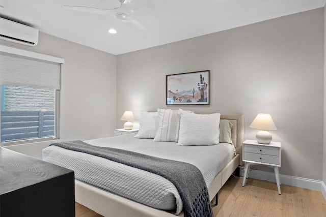 1707 Collier St, Austin, TX 78704 - bedroom with a wall mounted AC, light wood-type flooring, baseboards, recessed lighting, and a ceiling fan