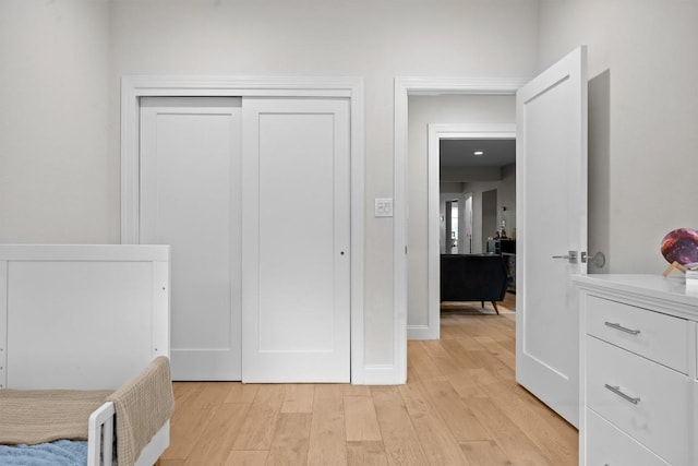 1707 Collier St, Austin, TX 78704 - bedroom featuring light wood finished floors and a closet