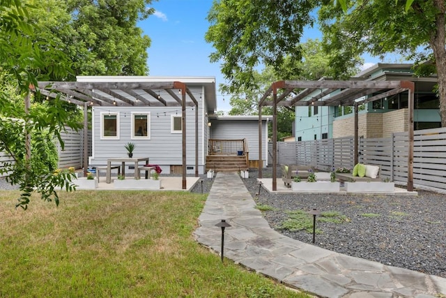 1707 Collier St, Austin, TX 78704 - view of front facade with a pergola and a front yard