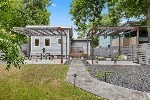 1707 Collier St, Austin, TX 78704 - view of front of property with a pergola and a front yard