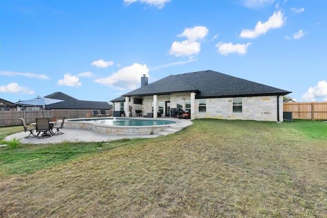 149 Metheglin Dr, Temple, TX 76502 - back of house featuring stone siding, a chimney, a patio area, a shingled roof, and central AC unit