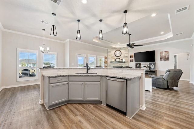 149 Metheglin Dr, Temple, TX 76502 - kitchen with dishwasher, a sink, open floor plan, a raised ceiling, and crown molding