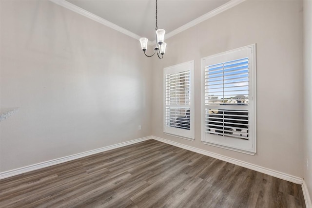149 Metheglin Dr, Temple, TX 76502 - unfurnished room with a chandelier, ornamental molding, dark wood finished floors, and baseboards