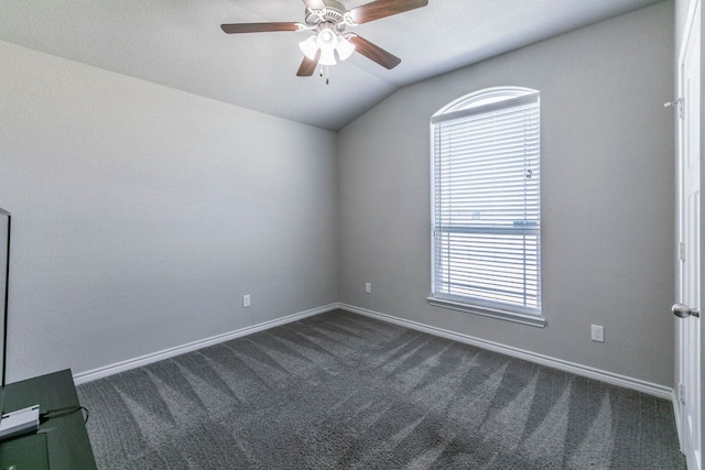 7002 Spirit Of The W Dr, Killeen, TX 76549 - spare room featuring vaulted ceiling, dark colored carpet, and ceiling fan