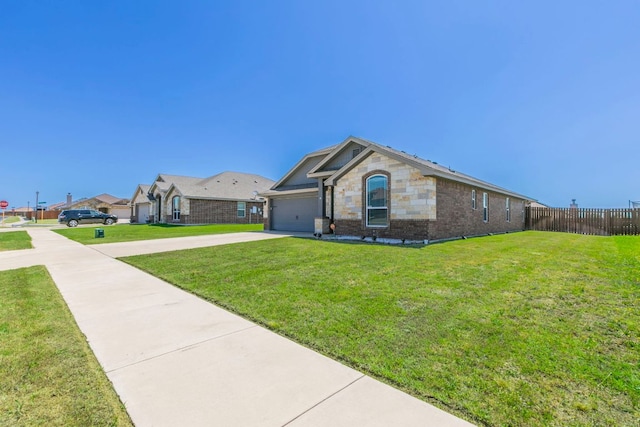 7002 Spirit Of The W Dr, Killeen, TX 76549 - ranch-style home with concrete driveway, a garage, and brick siding