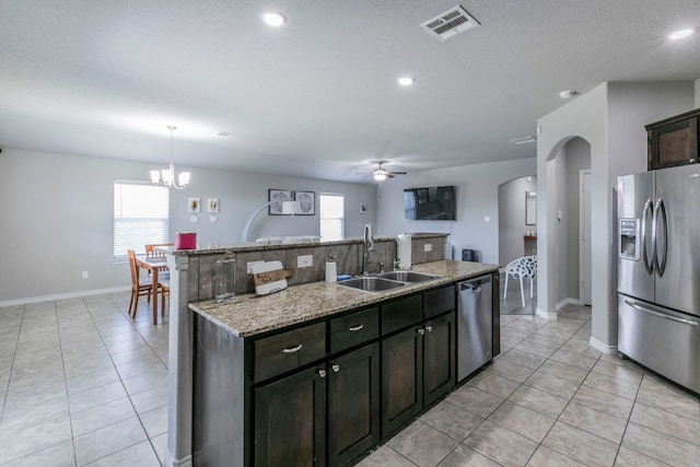7002 Spirit Of The W Dr, Killeen, TX 76549 - kitchen with appliances with stainless steel finishes, ceiling fan, light tile patterned floors, a center island with sink, and recessed lighting