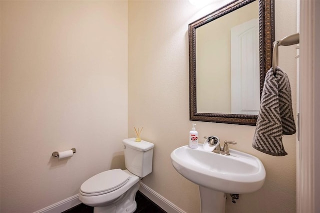 21305 Resource Rd, Pflugerville, TX 78660 - half bathroom with toilet and baseboards