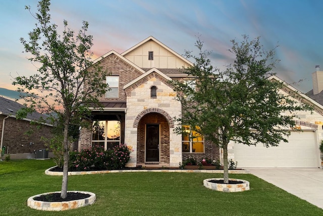 21305 Resource Rd, Pflugerville, TX 78660 - view of front facade featuring driveway, board and batten siding, a yard, an attached garage, and central AC unit