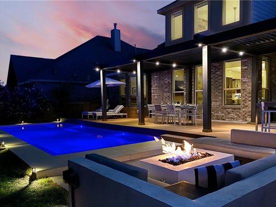 21305 Resource Rd, Pflugerville, TX 78660 - outdoor pool with a patio, outdoor dining area, and an outdoor living space with a fire pit