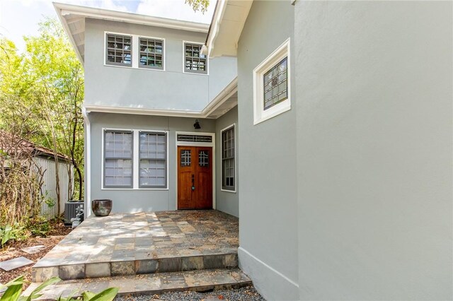 1206 W 22nd 1/2 St, Austin, TX 78705 - doorway to property featuring stucco siding