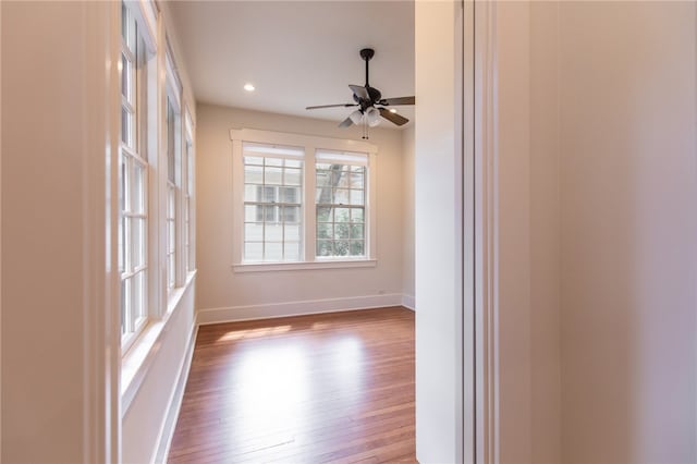 1206 W 22nd 1/2 St, Austin, TX 78705 - spare room featuring a ceiling fan, wood finished floors, baseboards, and recessed lighting