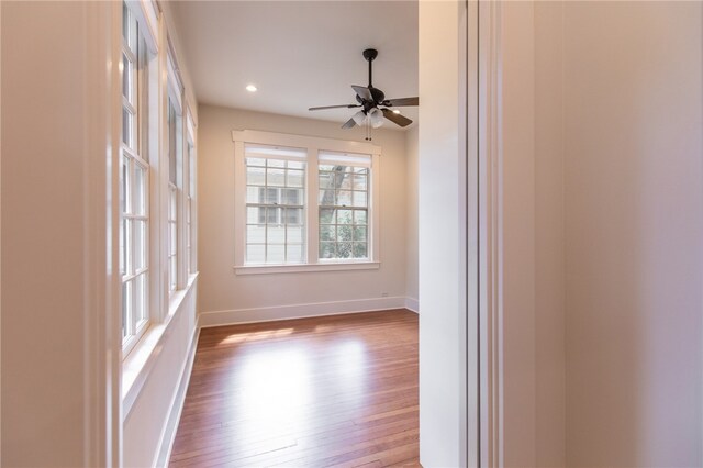 1206 W 22nd 1/2 St, Austin, TX 78705 - spare room featuring a ceiling fan, wood finished floors, baseboards, and recessed lighting