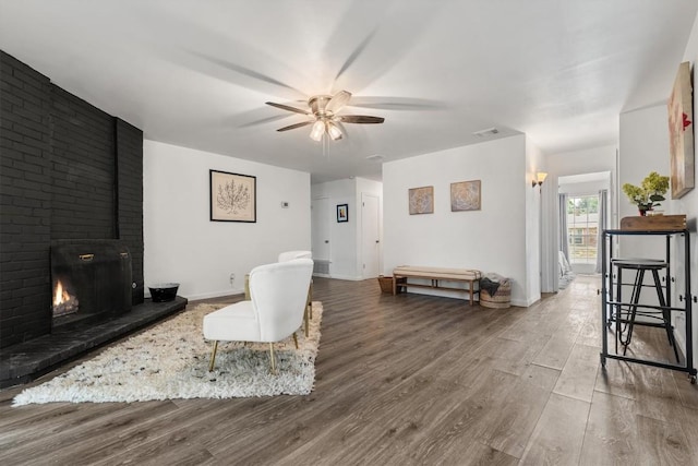 11533 Sandy Loam Trl, Austin, TX 78750 - living room with wood finished floors, ceiling fan, and baseboards