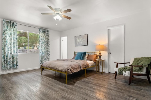 11533 Sandy Loam Trl, Austin, TX 78750 - bedroom featuring wood finished floors, baseboards, and ceiling fan