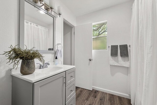 11533 Sandy Loam Trl, Austin, TX 78750 - full bath with vanity, wood finished floors, and baseboards