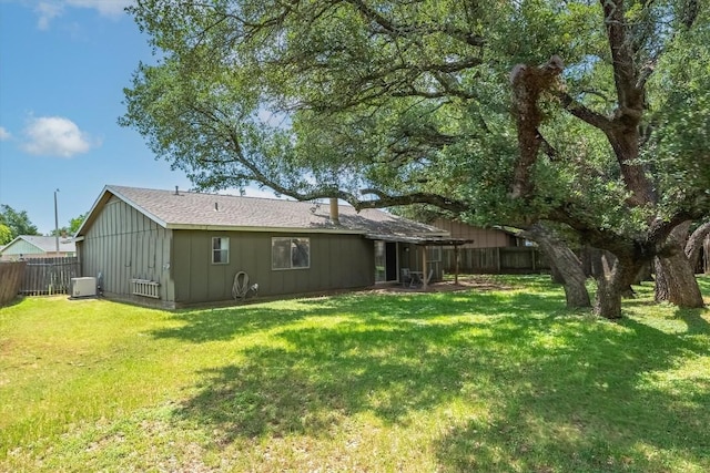 11533 Sandy Loam Trl, Austin, TX 78750 - back of house with board and batten siding