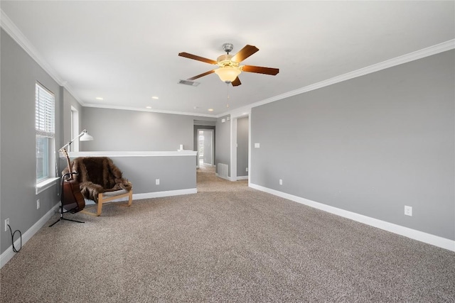 9008 Winter Haven Rd, Austin, TX 78747 - sitting room with a ceiling fan, healthy amount of natural light, ornamental molding, recessed lighting, and baseboards
