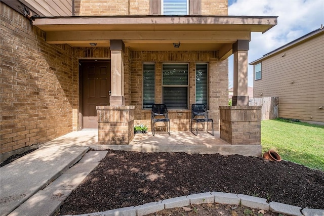 9008 Winter Haven Rd, Austin, TX 78747 - view of exterior entry with covered porch and brick siding