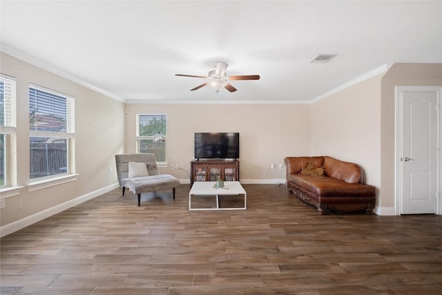 9008 Winter Haven Rd, Austin, TX 78747 - sitting room featuring a ceiling fan, wood finished floors, crown molding, and baseboards