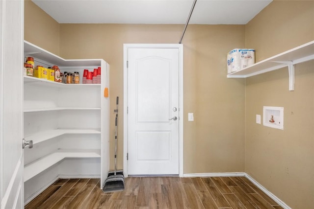 9008 Winter Haven Rd, Austin, TX 78747 - laundry area featuring wood finished floors and hookup for a washing machine