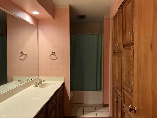 319 Fawnridge St, Georgetown, TX 78628 - bathroom featuring vanity, tile patterned flooring, and shower / bathtub combination with curtain