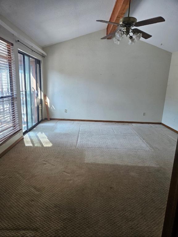 319 Fawnridge St, Georgetown, TX 78628 - unfurnished room featuring lofted ceiling, carpet floors, and ceiling fan