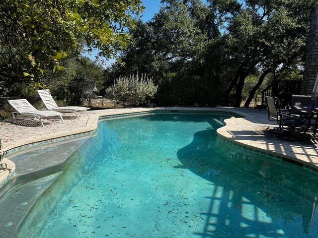319 Fawnridge St, Georgetown, TX 78628 - outdoor pool with a patio