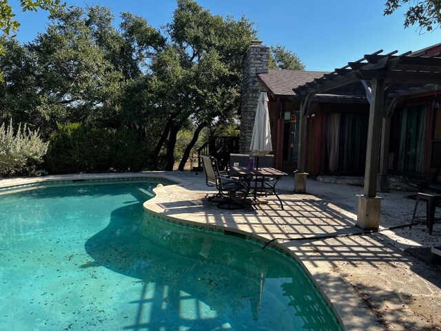 319 Fawnridge St, Georgetown, TX 78628 - swimming pool with a pergola and a patio