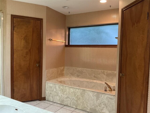 319 Fawnridge St, Georgetown, TX 78628 - full bath with wallpapered walls, a bath, tile patterned flooring, a closet, and vanity