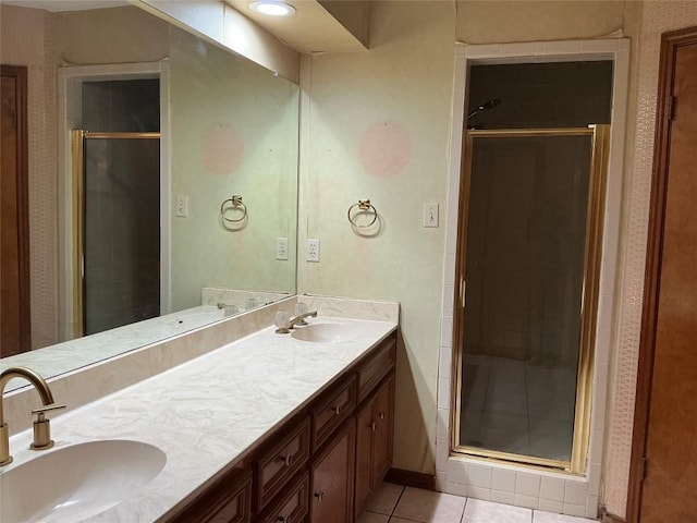 319 Fawnridge St, Georgetown, TX 78628 - full bath featuring tile patterned floors, a stall shower, and double vanity