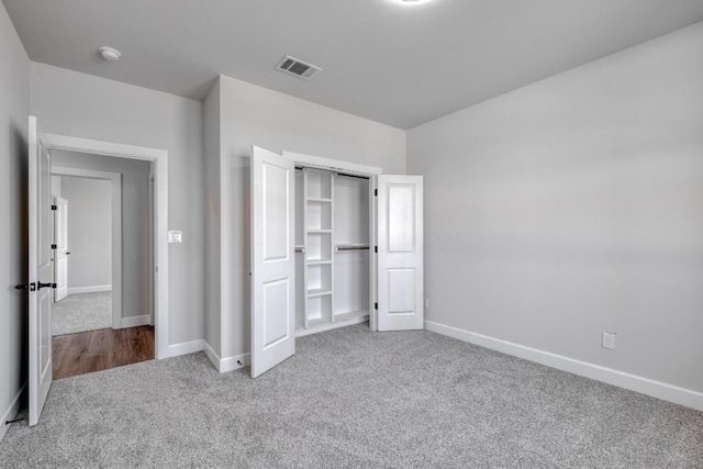 203 Alonzo Dr, Del Valle, TX 78617 - unfurnished bedroom with carpet flooring and a closet