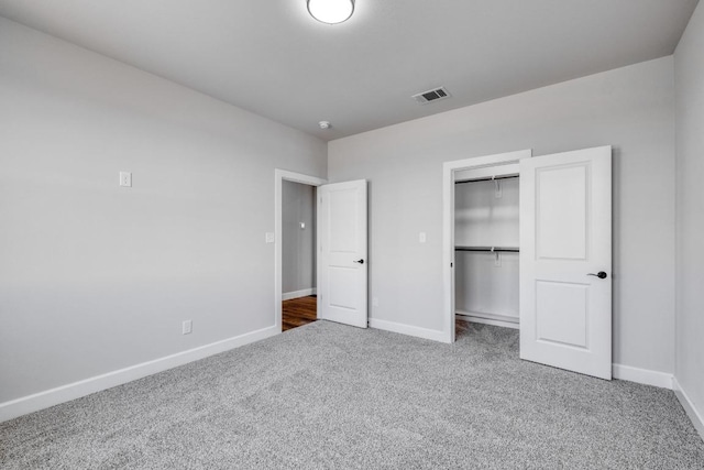 203 Alonzo Dr, Del Valle, TX 78617 - unfurnished bedroom featuring carpet flooring and a closet