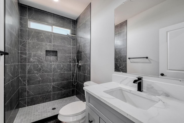 203 Alonzo Dr, Del Valle, TX 78617 - bathroom featuring vanity and tiled shower