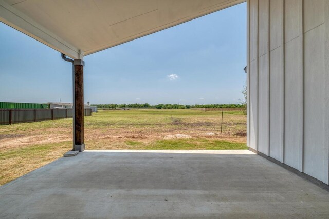 203 Alonzo Dr, Del Valle, TX 78617 - view of patio / terrace featuring a view of rural / pastoral area