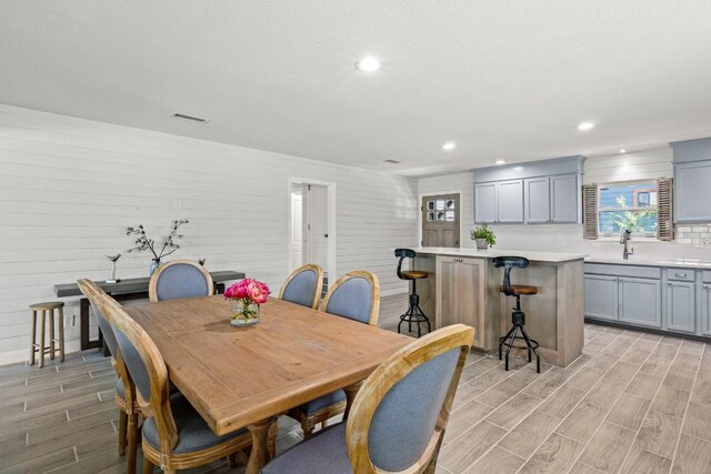 810 River Rd, Wimberley, TX 78676 - dining space with wood finish floors and recessed lighting