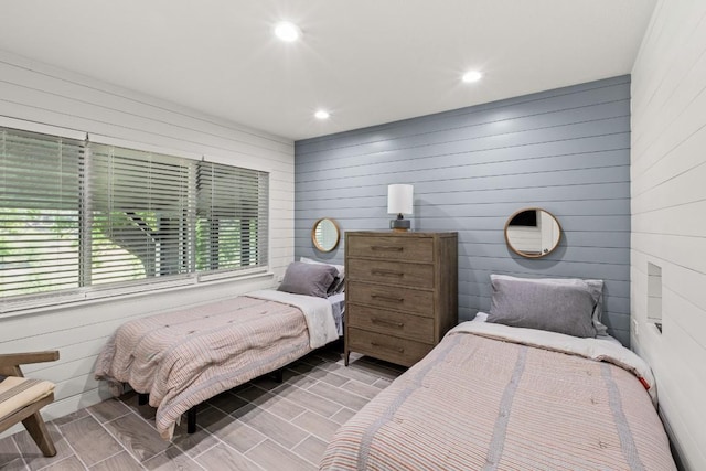 810 River Rd, Wimberley, TX 78676 - bedroom with wood walls and recessed lighting