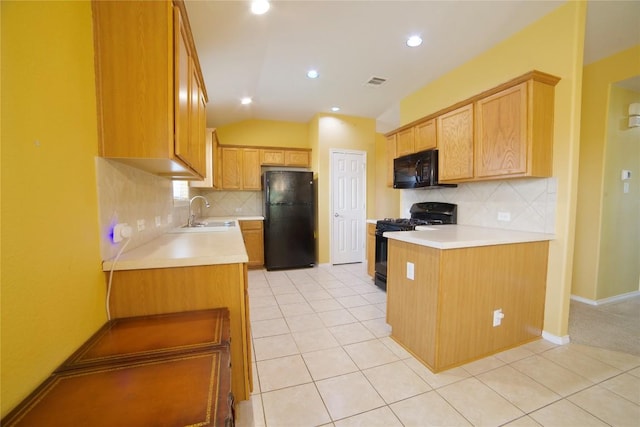 1800 Quiet Meadows Cv, Pflugerville, TX 78660 - kitchen with black appliances, light countertops, decorative backsplash, light tile patterned floors, and vaulted ceiling