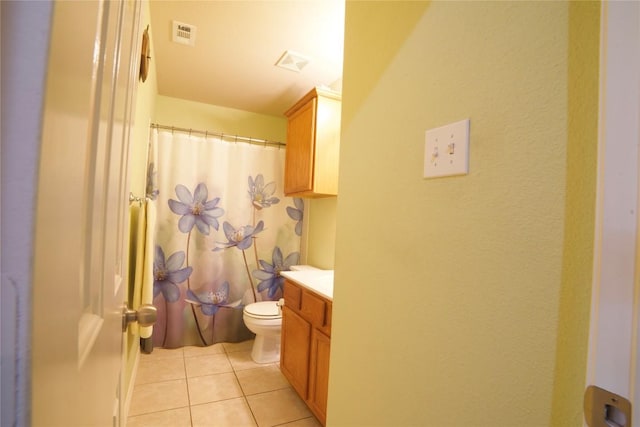 1800 Quiet Meadows Cv, Pflugerville, TX 78660 - bathroom featuring toilet, vanity, tile patterned floors, and a shower with shower curtain