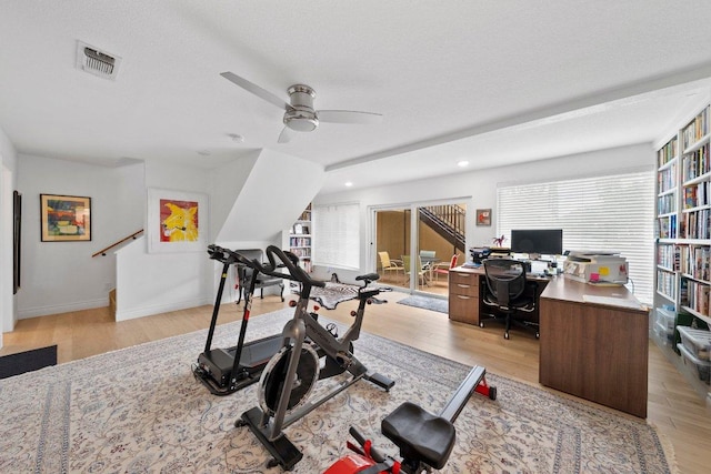 403 Horseshoe Bay Blvd N, Horseshoe Bay, TX 78657 - exercise area featuring wood finished floors, a ceiling fan, recessed lighting, and baseboards