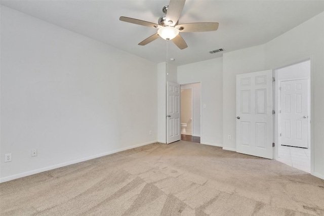 2225 Lou John St, Austin, TX 78727 - unfurnished bedroom featuring carpet, baseboards, and ceiling fan